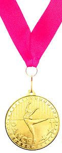 picture of a gold medal for a dance competition award hanging on a ribbon