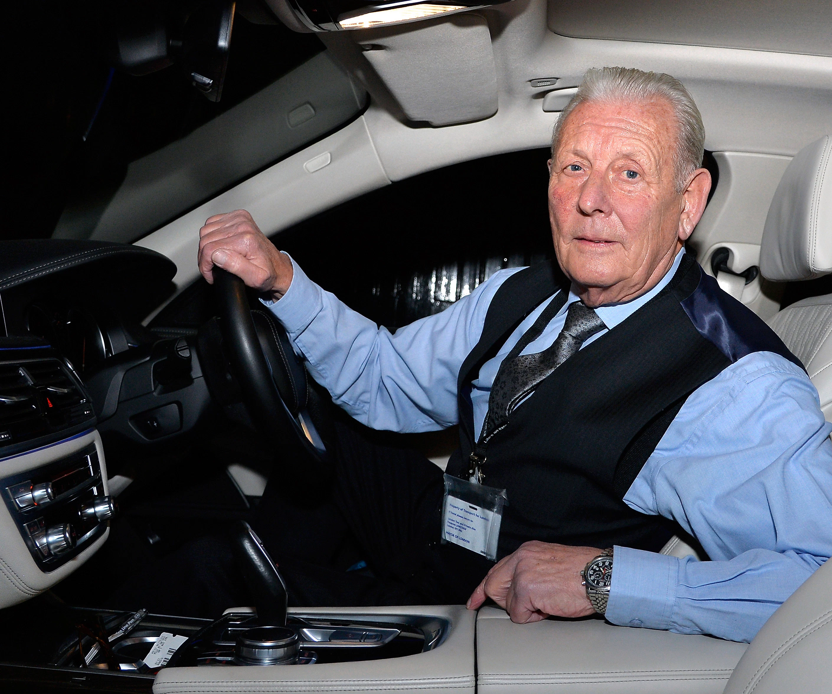 nattily-attired British cabbie